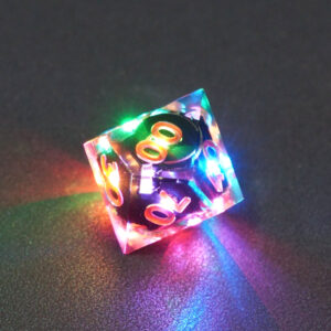 Lit Clear D00 with a rainbow of colors across each face. Clear colorway is fully transparent resin allowing internal circuit board to be visible. The numbers or symbols are painted metallic copper.