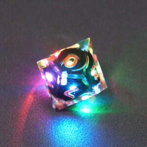 Lit Clear D10 with a rainbow of colors across each face. Clear colorway is fully transparent resin allowing internal circuit board to be visible. The numbers or symbols are painted metallic copper.