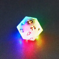 Lit Aurora Sky D20 with a rainbow of colors across each face. Aurora Sky colorway is a mostly translucent white resin base packed with small blue and silver glitter throughout. The numbers or symbols are painted metallic black.