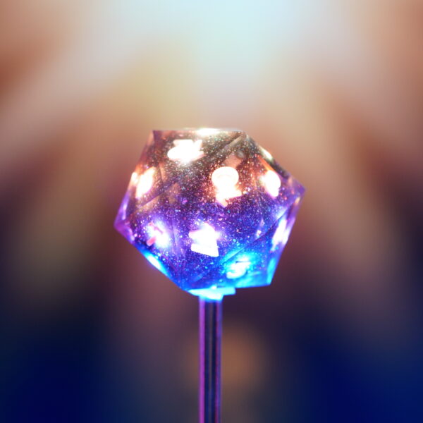 Lit Midnight Galaxy D20 with a rainbow of colors in front of a glowing background.