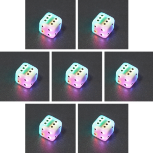 Collage of 7 lit Aurora Sky Pipped D6 with a rainbow of colors across each face. Aurora Sky colorway is a mostly translucent white resin base packed with small blue and silver glitter throughout. The numbers or symbols are painted metallic black.